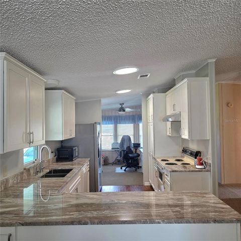 6114 GRAND OAKS DRIVE SE, Winter Haven, FL 33884