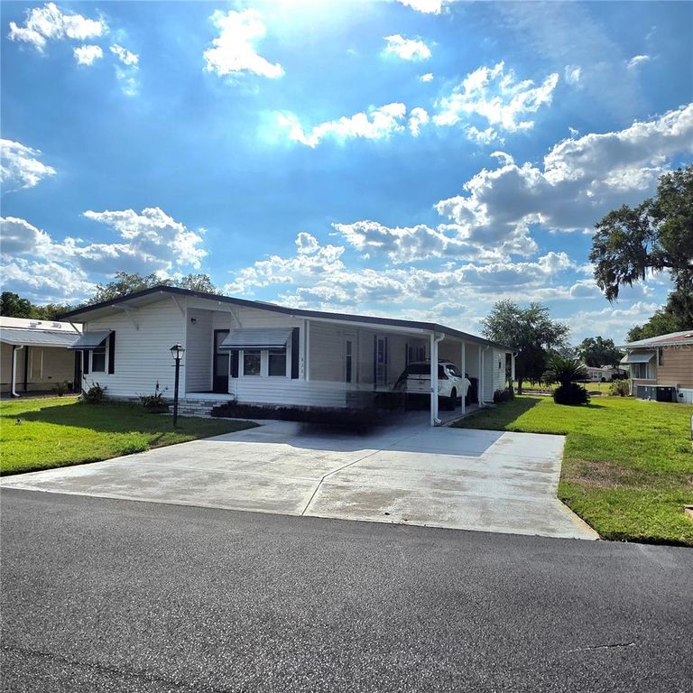 Image 2 of property listing at 6114 GRAND OAKS DRIVE SE, Winter Haven, FL 33884