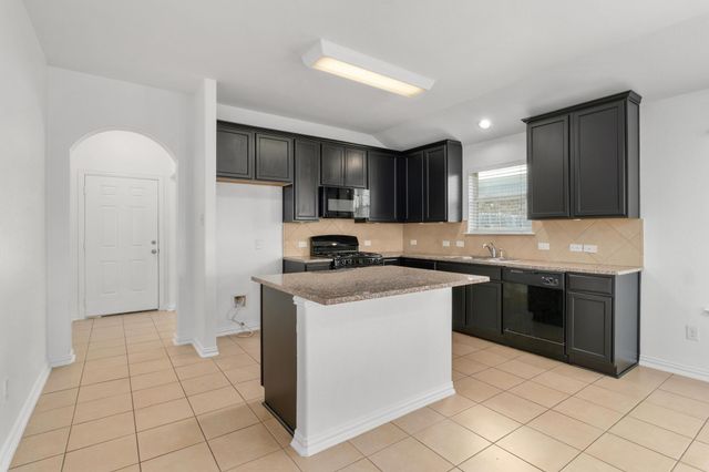 217 Strawberry Blonde DR, Buda, TX 78610