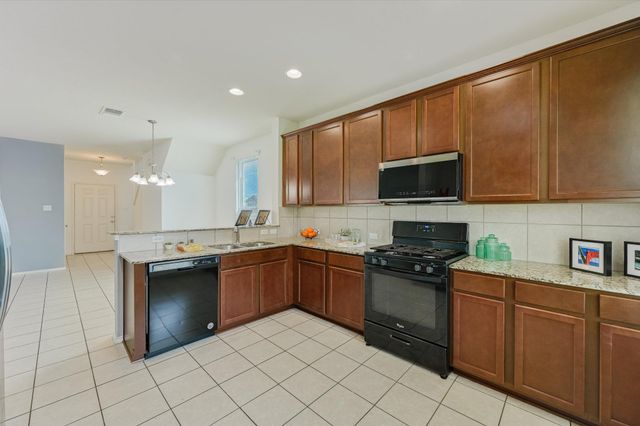 220 Nettletree DR, Buda, TX 78610