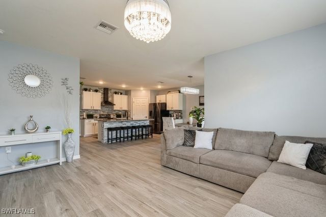 10313 Silver Pond LN, Lehigh Acres, FL 33936