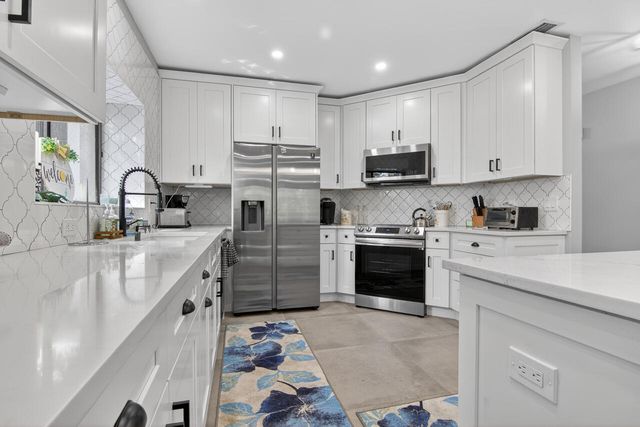 1143 Duncan Circle Unit 104, Palm Beach Gardens, FL 33418