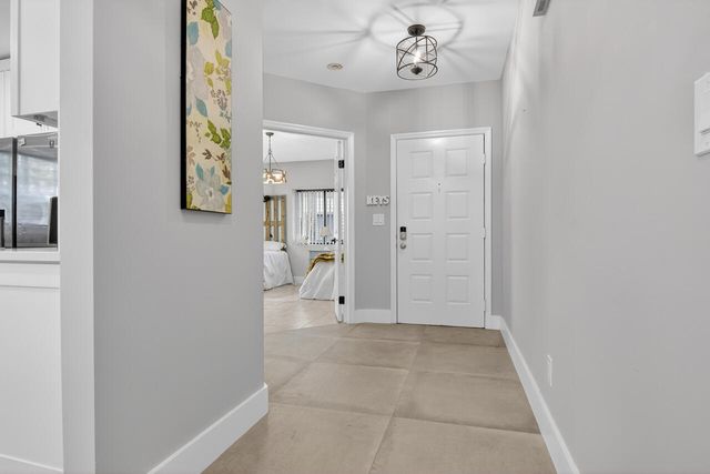 1143 Duncan Circle Unit 104, Palm Beach Gardens, FL 33418