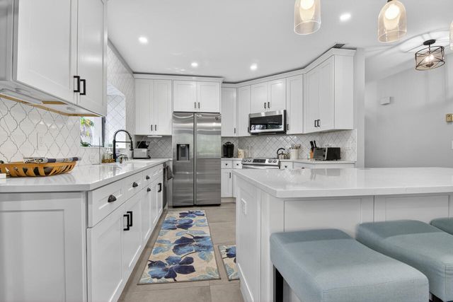 1143 Duncan Circle Unit 104, Palm Beach Gardens, FL 33418