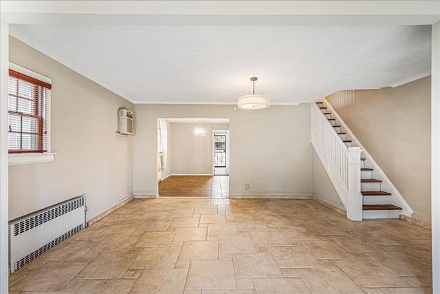 90-43 70th Drive, New York City, NY 11375