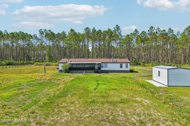 12027 PALMETTO Place, Sanderson, FL 32087