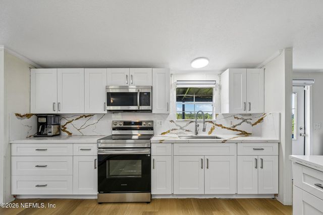 12027 PALMETTO Place, Sanderson, FL 32087