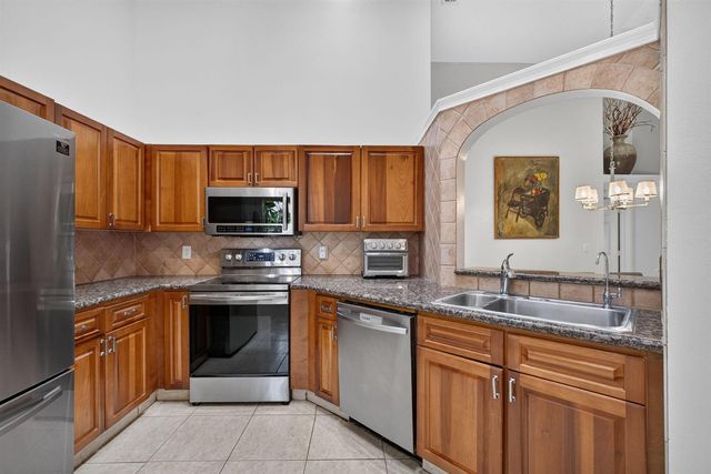 1602 Rosewood Way, Palm Beach Gardens, FL 33418