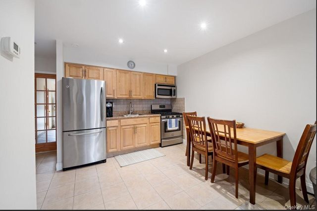 6923 66th Drive, Middle Village, NY 11379