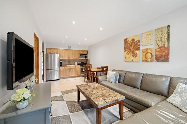 6923 66th Drive, Middle Village, NY 11379