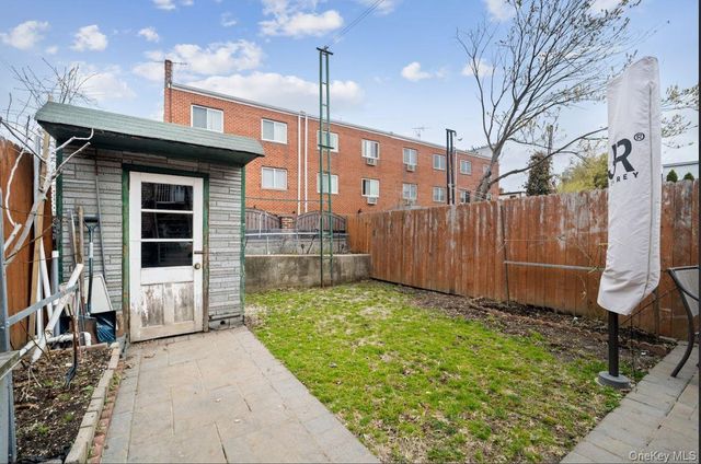 6923 66th Drive, Middle Village, NY 11379