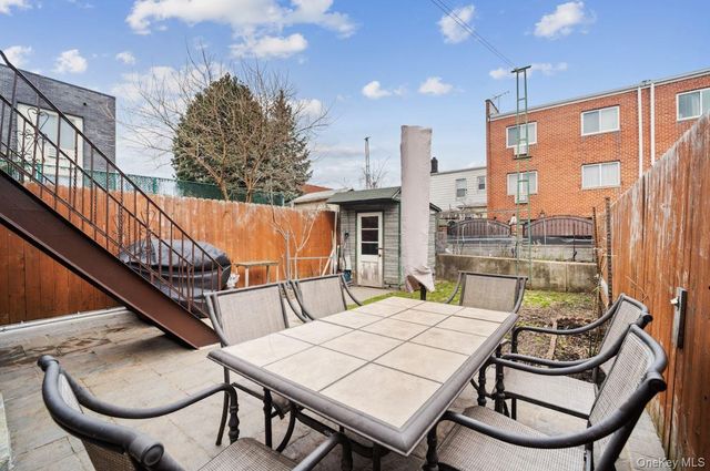 6923 66th Drive, Middle Village, NY 11379