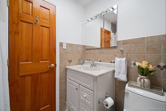 6923 66th Drive, Middle Village, NY 11379
