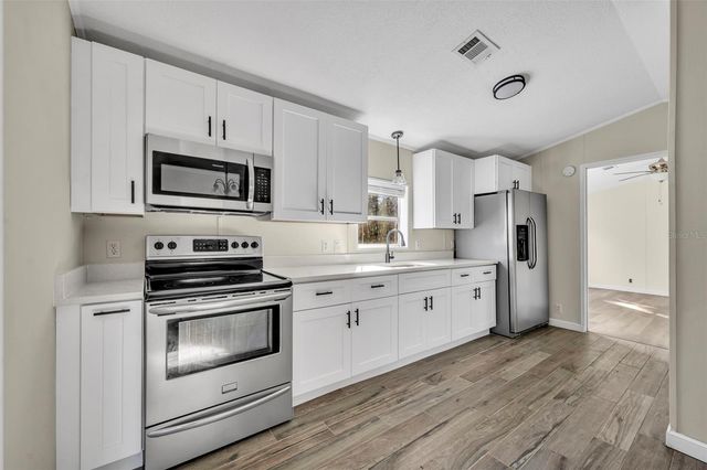 6180 WINNING WOOD TRAIL, De Leon Springs, FL 32130