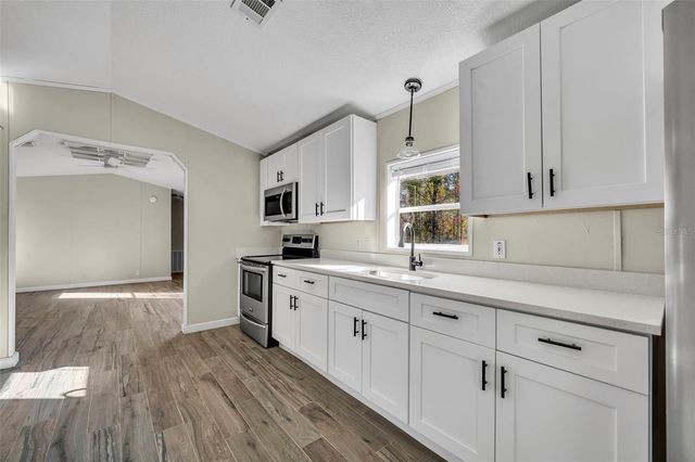 6180 WINNING WOOD TRAIL, De Leon Springs, FL 32130