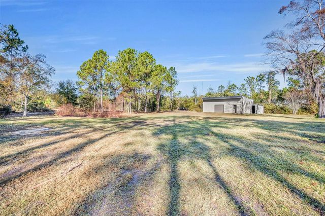 6180 WINNING WOOD TRAIL, De Leon Springs, FL 32130