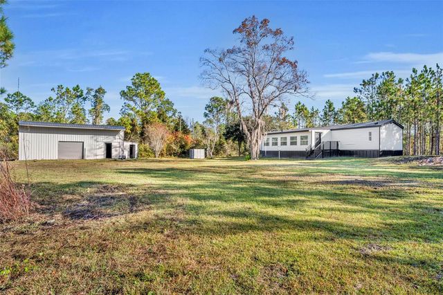 6180 WINNING WOOD TRAIL, De Leon Springs, FL 32130