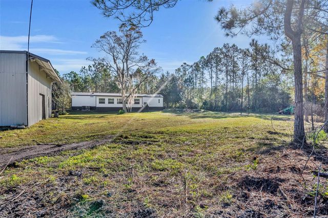 6180 WINNING WOOD TRAIL, De Leon Springs, FL 32130