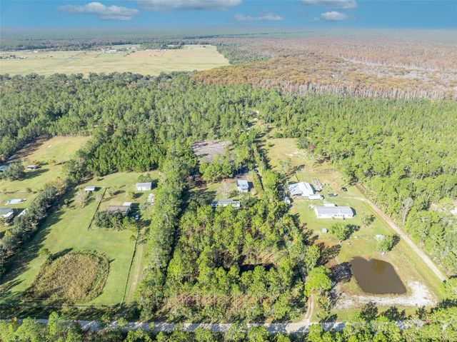 6180 WINNING WOOD TRAIL, De Leon Springs, FL 32130