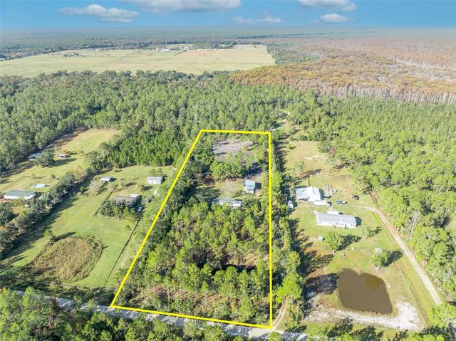 6180 WINNING WOOD TRAIL, De Leon Springs, FL 32130