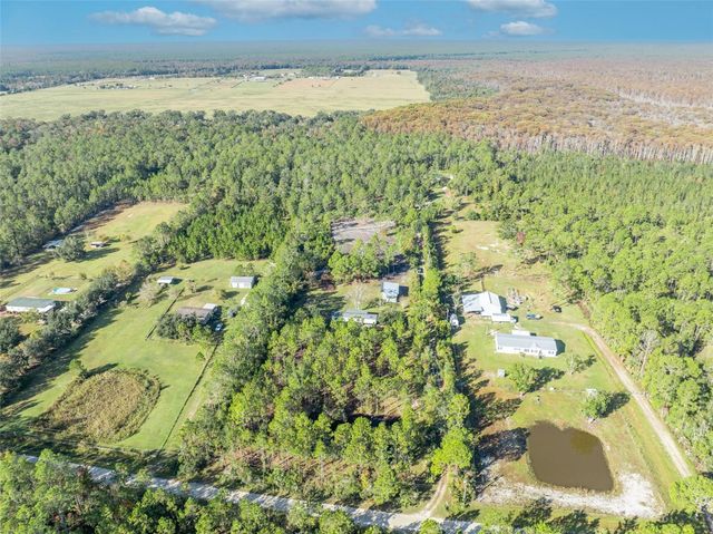 6180 WINNING WOOD TRAIL, De Leon Springs, FL 32130