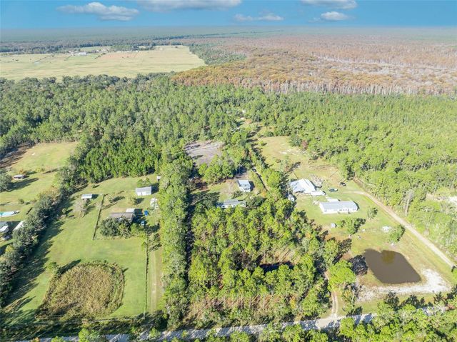 6180 WINNING WOOD TRAIL, De Leon Springs, FL 32130