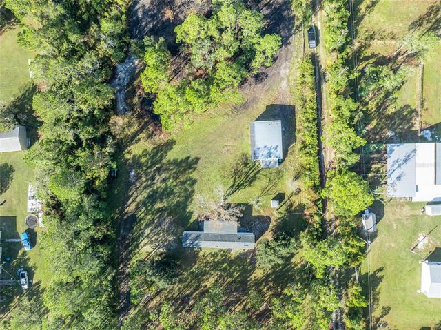 6180 WINNING WOOD TRAIL, De Leon Springs, FL 32130