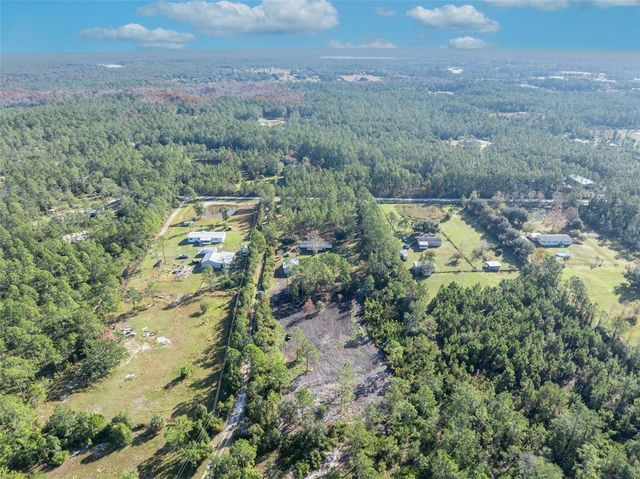6180 WINNING WOOD TRAIL, De Leon Springs, FL 32130