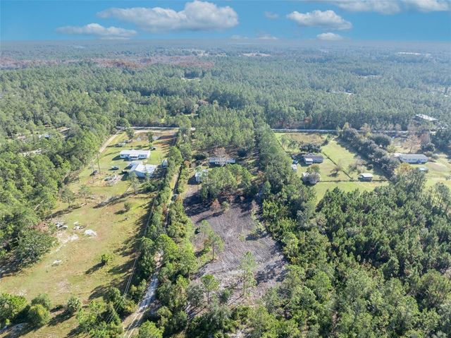 6180 WINNING WOOD TRAIL, De Leon Springs, FL 32130