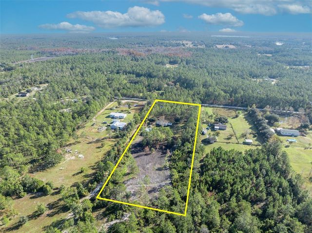 6180 WINNING WOOD TRAIL, De Leon Springs, FL 32130