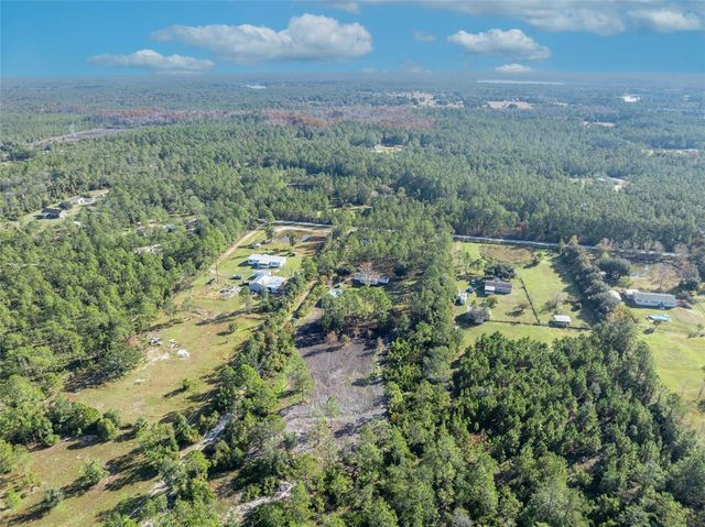 6180 WINNING WOOD TRAIL, De Leon Springs, FL 32130