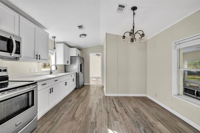 6180 WINNING WOOD TRAIL, De Leon Springs, FL 32130