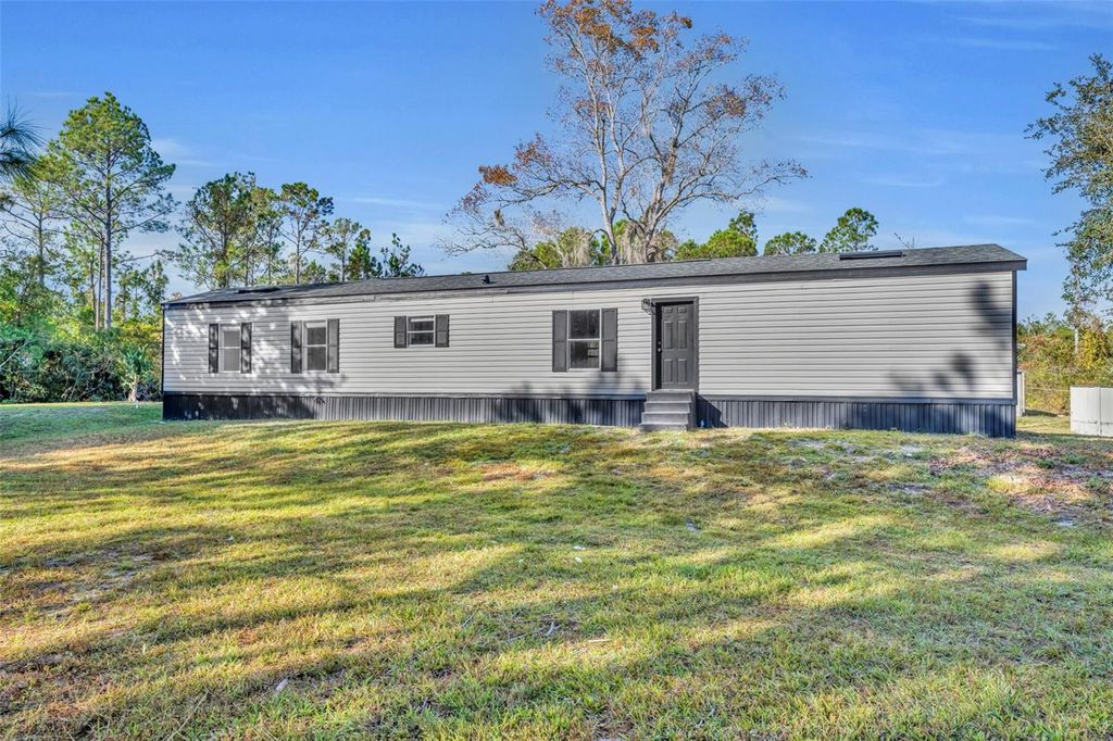 6180 WINNING WOOD TRAIL, De Leon Springs, FL 32130