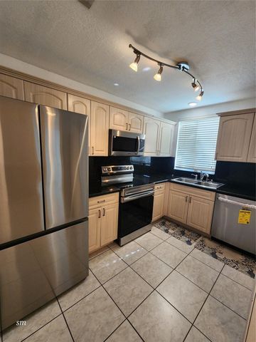 119 Hidden Court Road, Hollywood, FL 33023