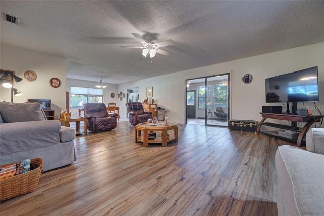 1055 W VILLAGE GREEN RD, Deland, FL 32720
