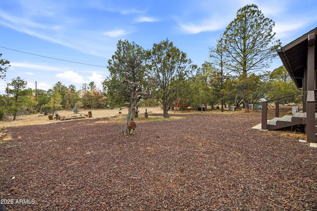 3113 WHITETAIL Way, Overgaard, AZ 85933