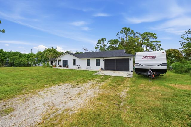 11823 N 67th Pl Place N, The Acreage, FL 33412