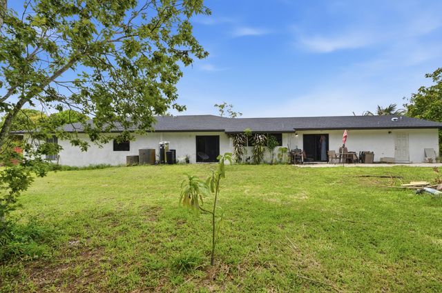 11823 N 67th Pl Place N, The Acreage, FL 33412