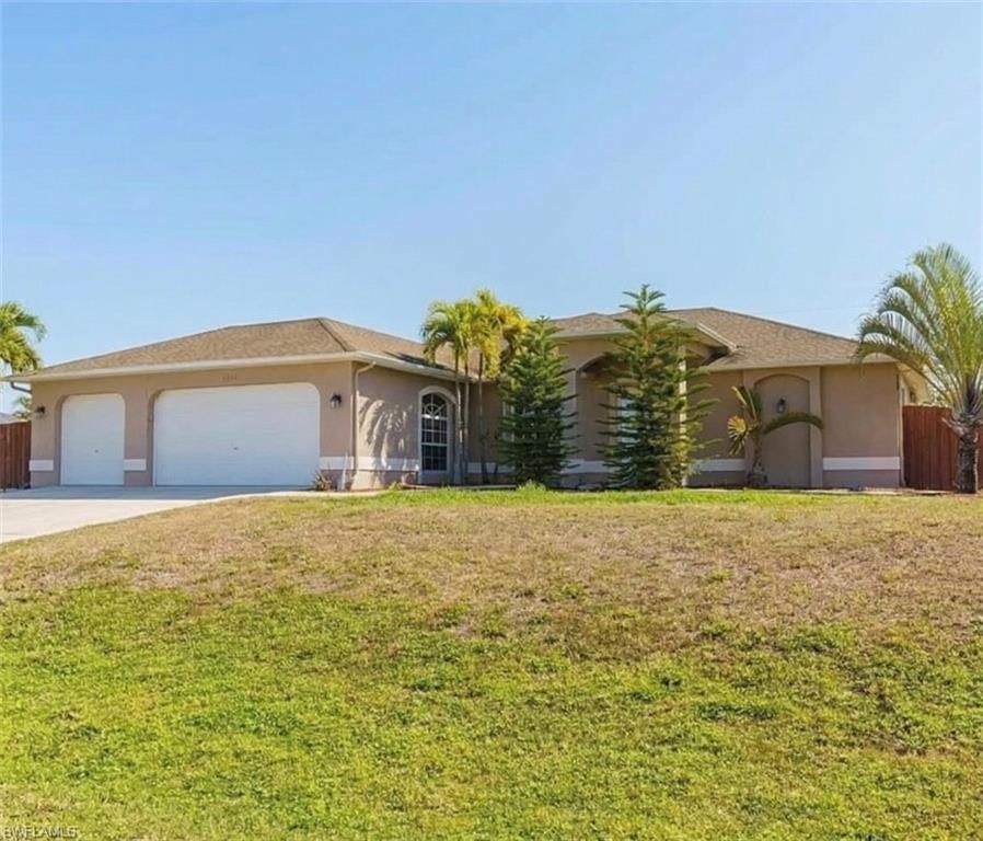 1031 NE 2nd PL, CAPE CORAL, FL 33909 — exterior