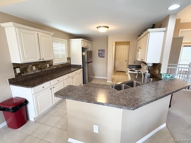 27992 Tremonte Drive 12, New Hudson, MI 48165