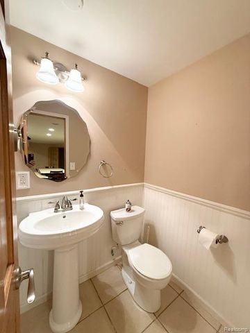 27992 Tremonte Drive 12, New Hudson, MI 48165