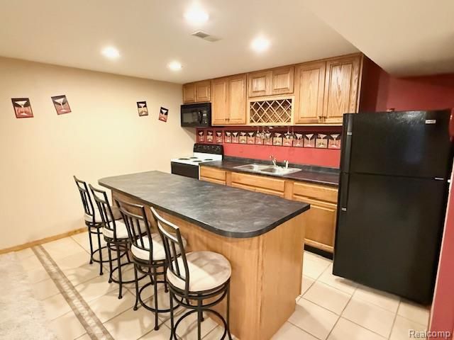27992 Tremonte Drive 12, New Hudson, MI 48165