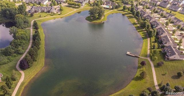 27992 Tremonte Drive 12, New Hudson, MI 48165