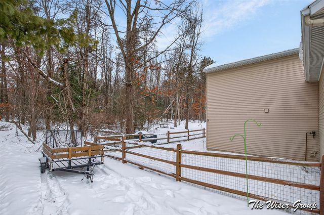 1207 Cedarwood Drive, Greenville, MI 48838