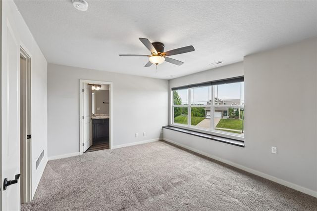 423 Wildcat Court, Stuart, IA 50250