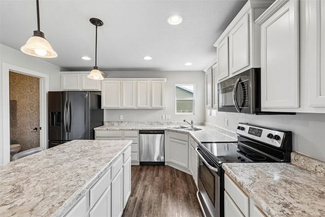 423 Wildcat Court, Stuart, IA 50250
