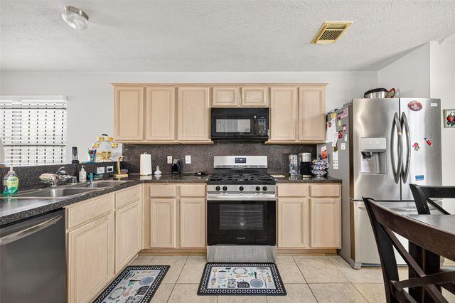 1302 E April Rain Court, Missouri City, TX 77489
