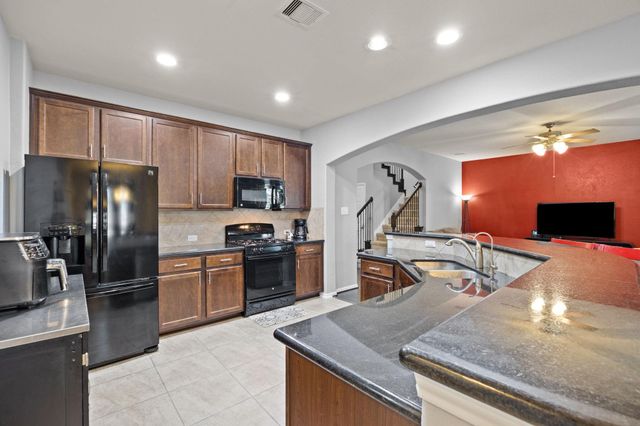 204 Rippling Creek Lane, Alvin, TX 77511