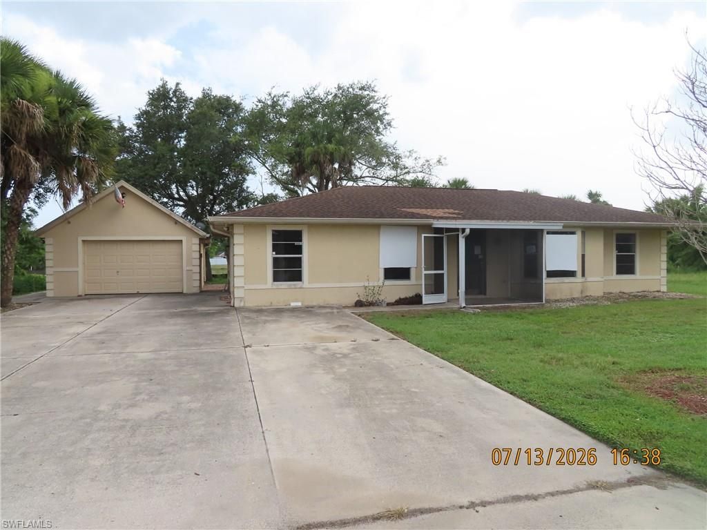 602 Harrison DR, LEHIGH ACRES, FL 33936 — exterior