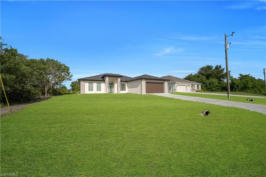 2406 Vera AVE S, LEHIGH ACRES, FL 33976 — exterior
